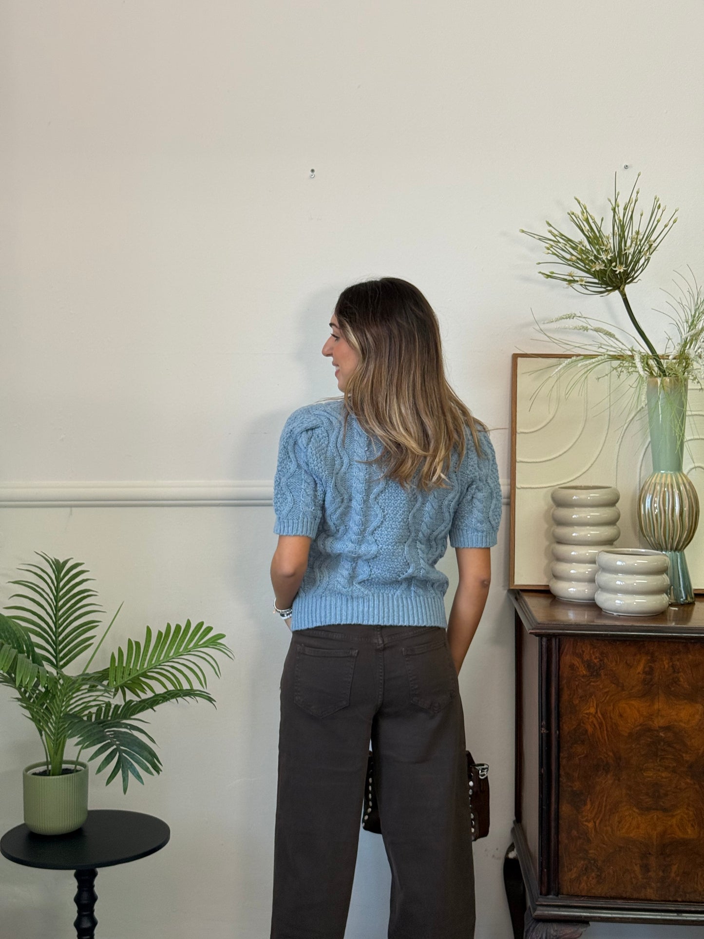 Maglione con perle e fiocchetti